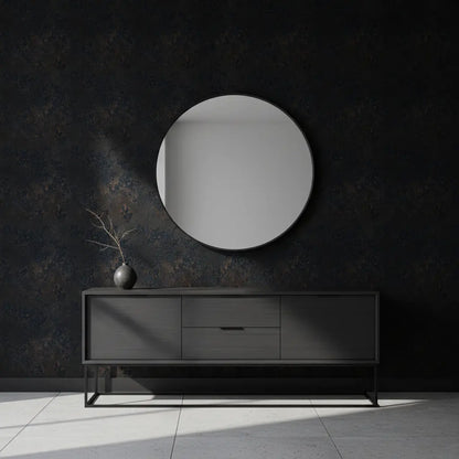 Selbstklebende Tapete Dunkle Strukturbetonoptik – Burnt Concrete in modernem Flur mit runder Spiegelwand und schwarzem Sideboard.